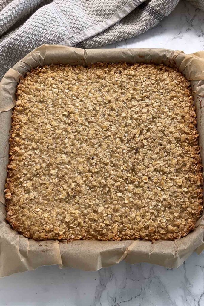 baked oat bar mixture in tin