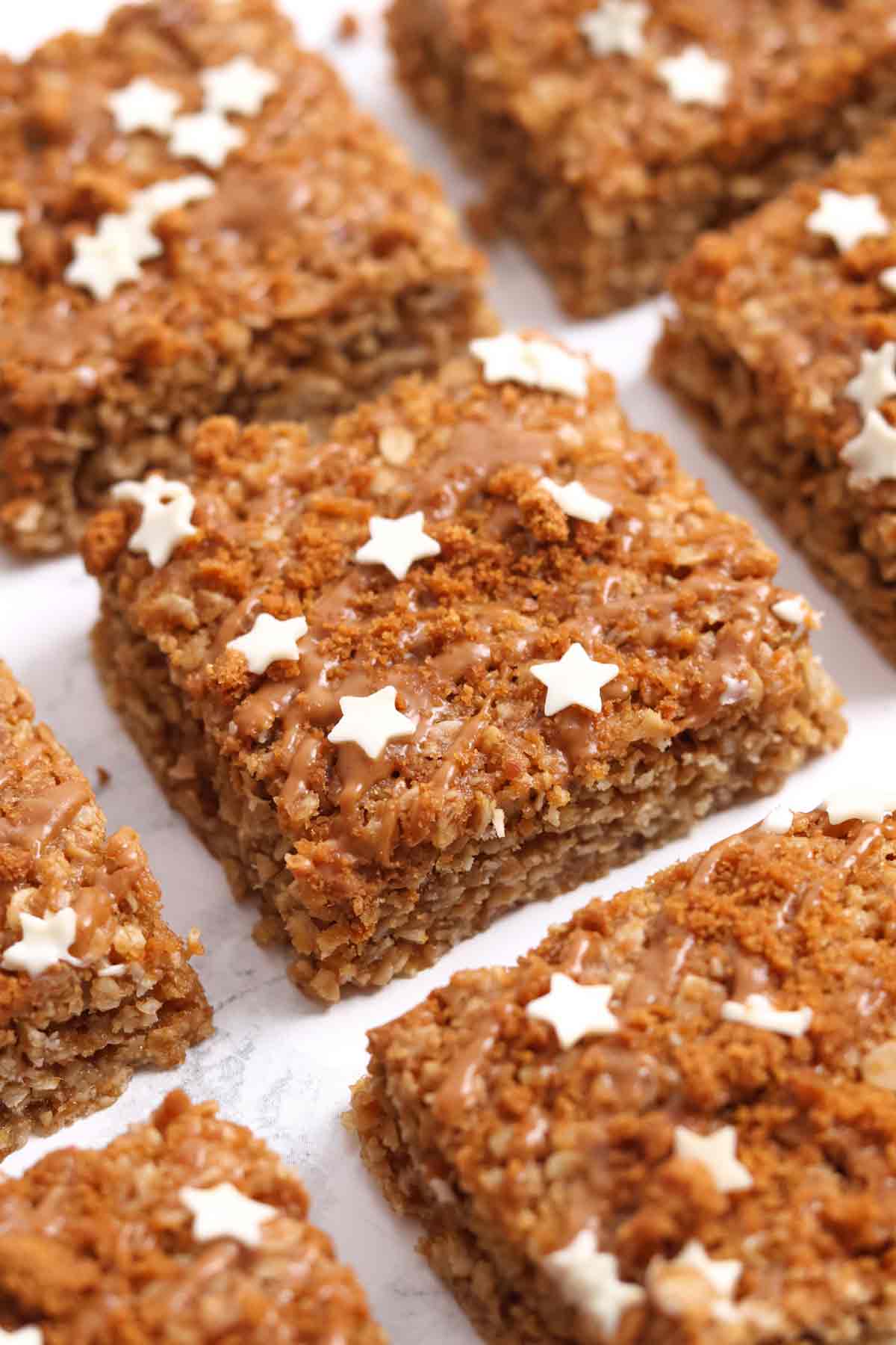 bars of biscoff flapjacks on a white surface