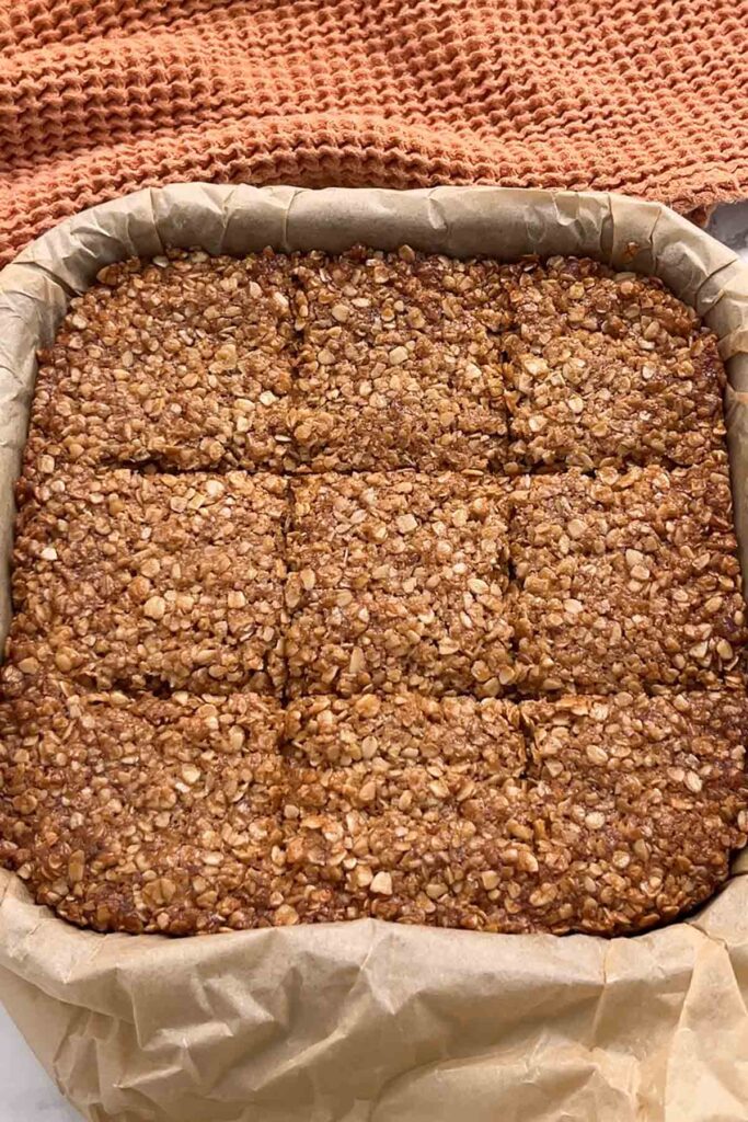 scored oat flapjack in tin