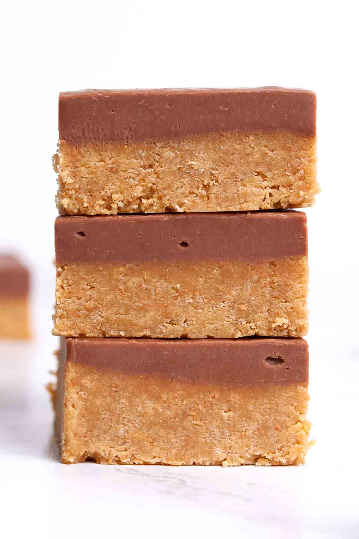 stack of 3 pieces of condensed milk digestive biscuit traybake slice