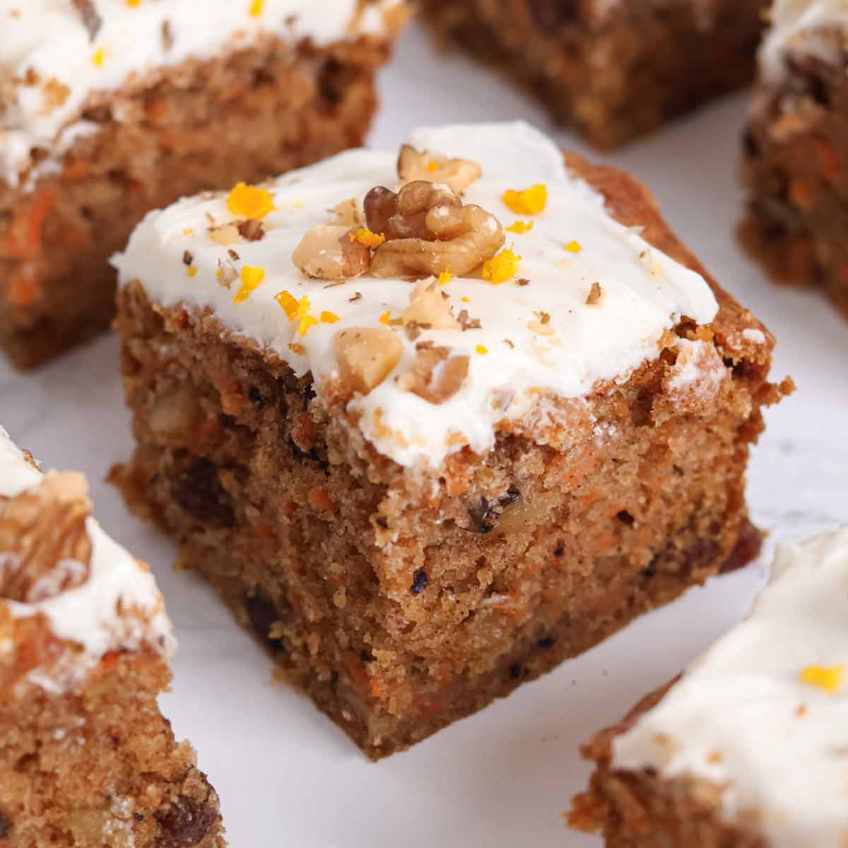 thumbnail image of square slices of carrot cake traybake