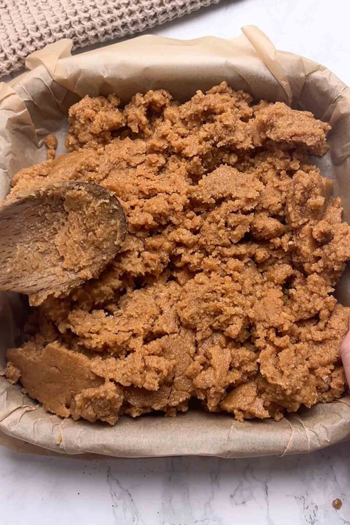 wet biscuit mixture in tin