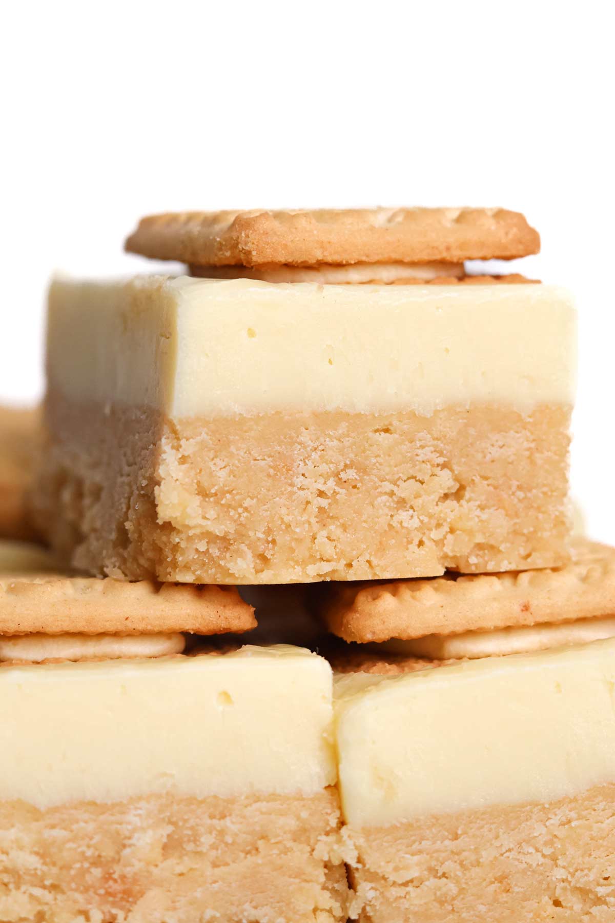 close up of slices of custard cream biscuit traybake