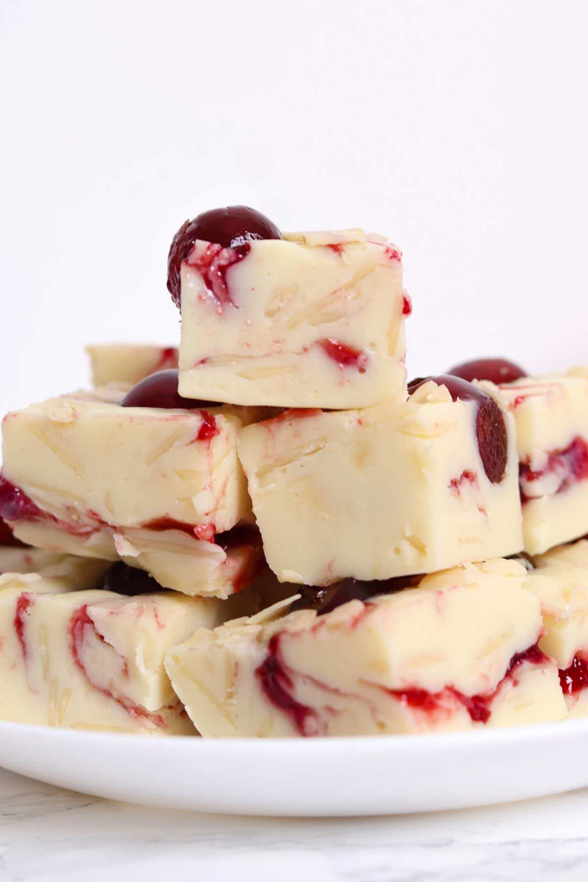 a plate of cherry bakewell fudge