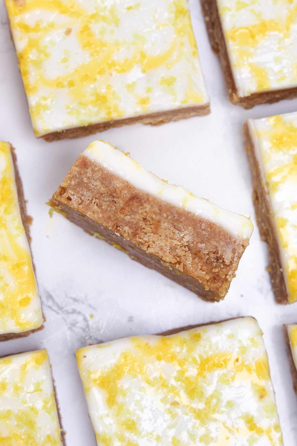 overhead image of no bake lemon drizzle biscuit slice